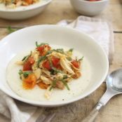 GOAT CHEESE GRITS WITH BURST TOMATOES AND CHICKEN
