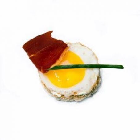 Huevos con Jamón en torta de papa