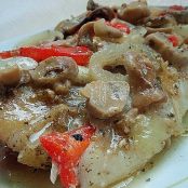 MERO AL HORNO CON CHAMPIÑONES Y PIMIENTOS