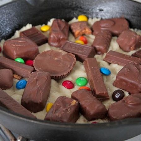 Skillet Baked Candy Bar Stuffed Double Cookie