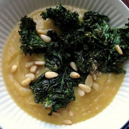 Acorn squash soup with roasted kale chips and pine nuts