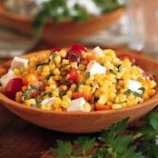 Pan roasted corn salad with tomatoes and feta