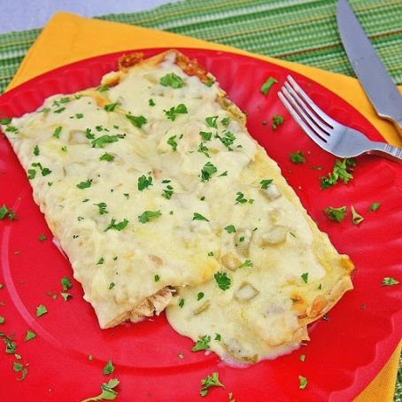 White Chicken Enchiladas with Green Chili Sour Cream Sauce