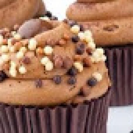 Chocolate cupcakes with whipped cream frosting