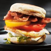 Breakfast Egg, Crispy Bacon, Heirloom Tomatoes & Brie on Toasted English Muffins