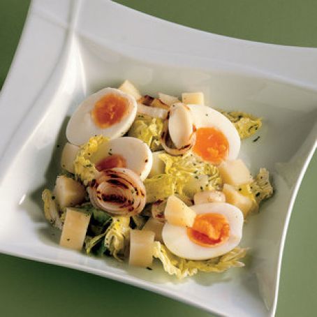 romaine salad with grilled onion, potatoes and gently boiled eggs barzotte, su verdure cotte e crude, e uova