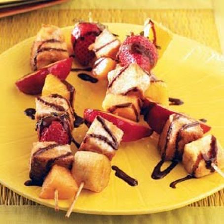 Grilled Fruit Skewers with chocolate syrup