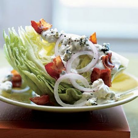 Iceberg Wedge with Warm Bacon and Blue Cheese Dressing  Read More http://www.epicurious.com/recipes/
