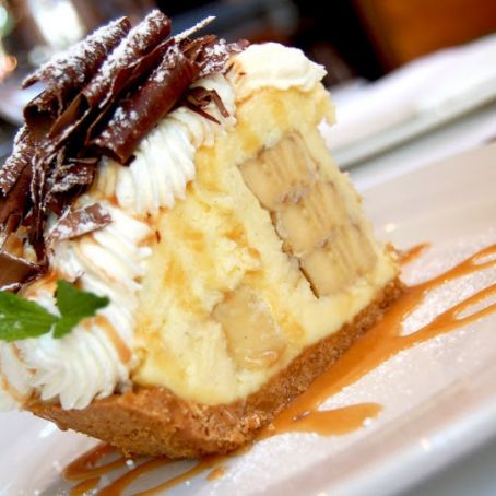 Banana Cream Pie With Caramel Drizzles And Chocolate Sauce
