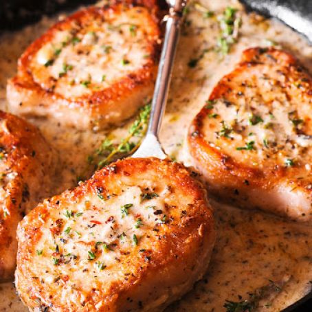 Pork Chops in Creamy Garlic and White Wine Herb Sauce