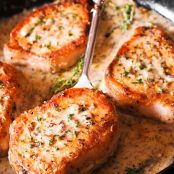 Pork Chops in Creamy Garlic and White Wine Herb Sauce