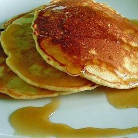 Coconut pancakes with cardamom syrup