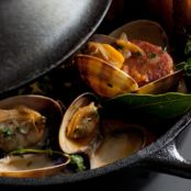 Steamed Manila Clams with Tomato, Vermouth, Linguica Sausage and Toasted Focaccia