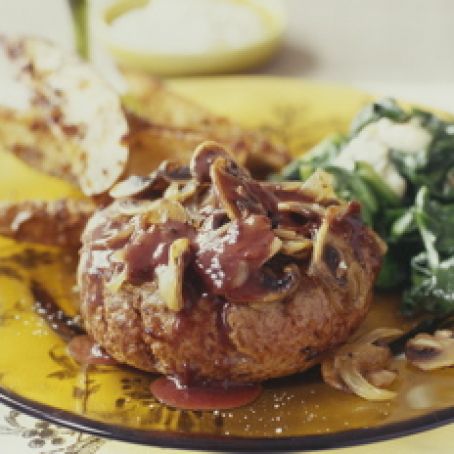 Sliced Steaks with Porcini Sauce and Boursin Creamed Spinach