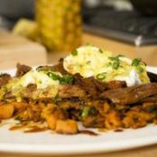 Sour Orange Pork with Sweet Potato-Hash, Fried Eggs and Sofrito Hollandaise