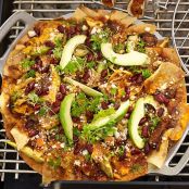 Chile con Queso Nachos with Guajillo Short Ribs and Avocado