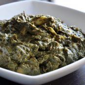 Aloo Palak (potatoes cooked in a creamy spinach gravy)