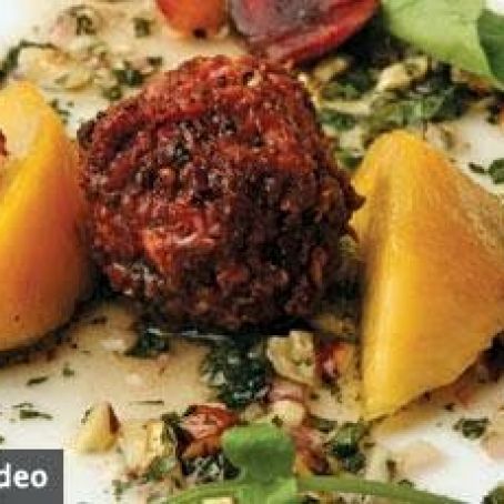 Palisade Peach Salad with Crispy Prosciutto-Crusted Goat Cheese Balls and Hazelnut-Mint Vinaigrette