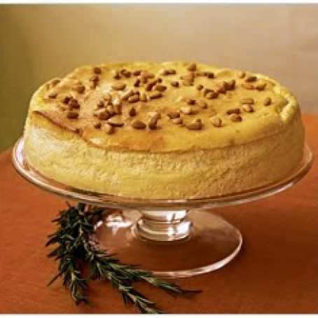 Ricotta Cheesecake With Lemon Drizzle and Pine Nuts