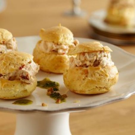 Goat Cheese and Sun Dried Tomato Profiteroles with Herb Oil
