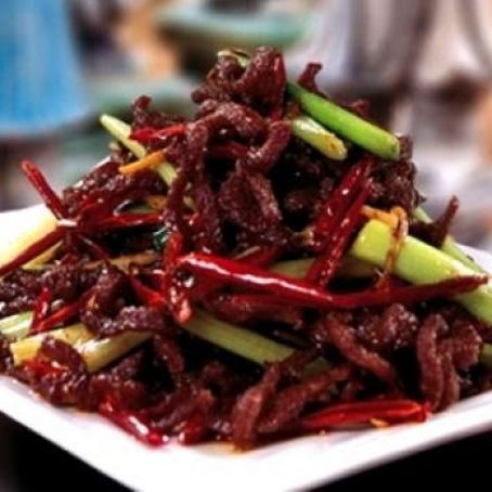 Stekta biffstrimlor i kinesiskt risvin