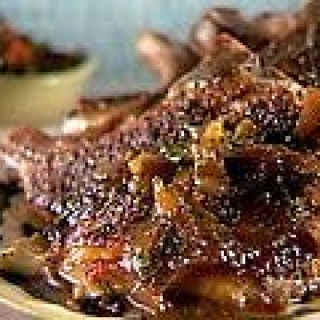 Apple and Onion-Stuffed Pork Chops with Orange-Pineapple Gravy