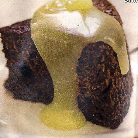 Steamed cranberry pudding with butter sauce