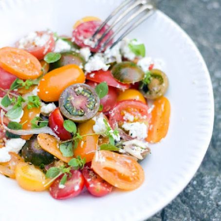 Heirloom Tomato Salad with Garlic Dressing and Goat Cheese